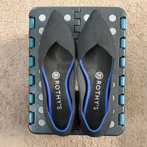 Rothy's Elegant Black Flats with Blue Trim